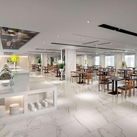 Ramada By Wyndham Mengzi Suites Exteriör bild