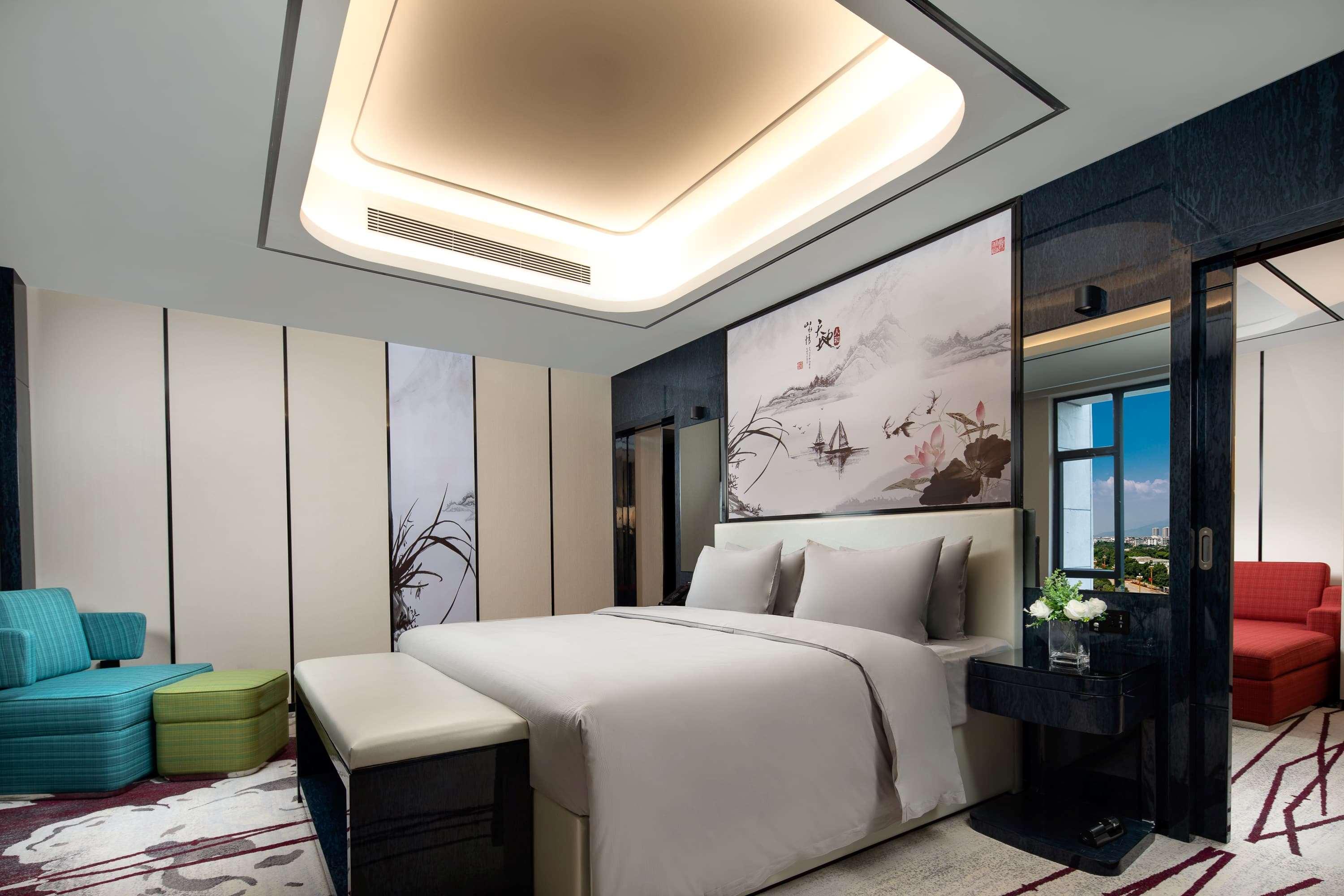 Ramada By Wyndham Mengzi Suites Exteriör bild