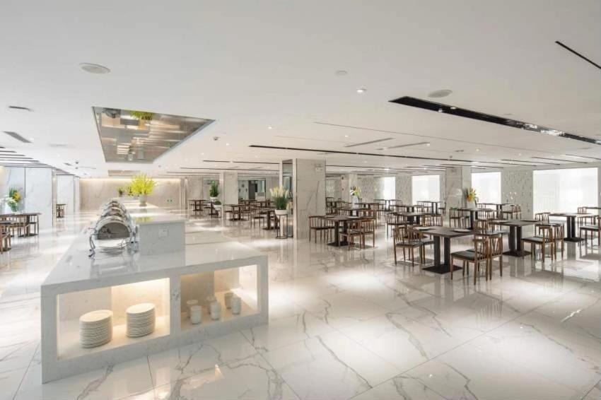 Ramada By Wyndham Mengzi Suites Exteriör bild